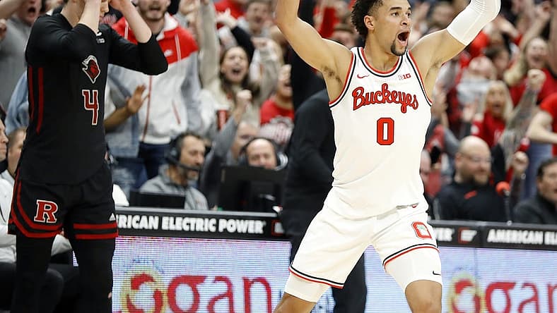 Dec 8, 2022; Columbus, Ohio, USA; Ohio State Buckeyes guard Tanner Holden (0) celebrates after making the game winning three-point shot as time ran out against the Rutgers Scarlet Knights at Value City Arena. Mandatory Credit: Joseph Maiorana-USA TODAY Sports