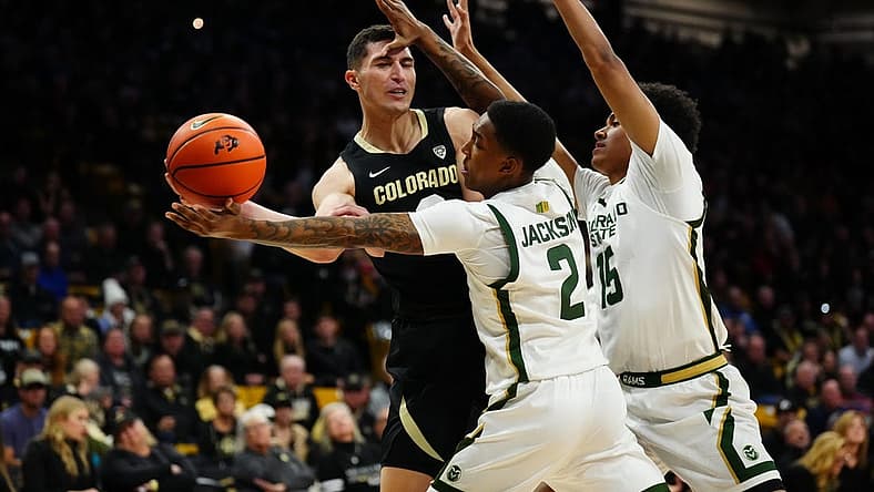 Dec 8, 2022; Boulder, Colorado, USA; Colorado State Rams guard Taviontae Jackson (2) and Colorado State Rams guard Jalen Lake (15) defend on Colorado Buffaloes guard Luke O'Brien (0) in the first half at the CU Events Center. Mandatory Credit: Ron Chenoy-USA TODAY Sports