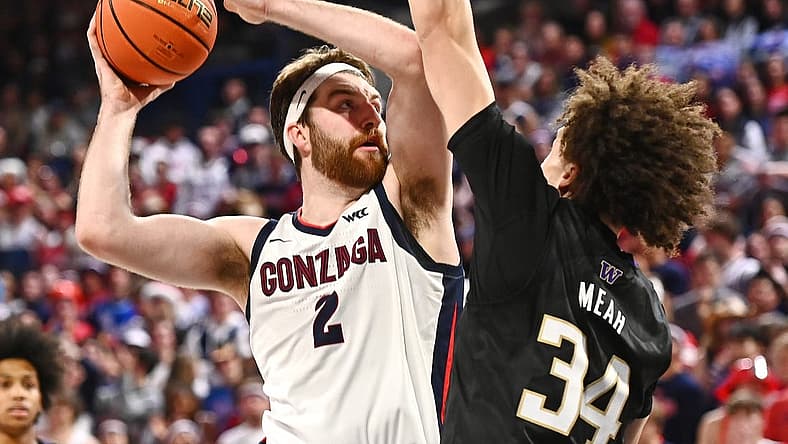 Dec 9, 2022; Spokane, Washington, USA; Gonzaga Bulldogs forward Drew Timme (2) shoots the ball against Washington Huskies center Braxton Meah (34) in the second half at McCarthey Athletic Center. Gonzaga won 77-60. Mandatory Credit: James Snook-USA TODAY Sports