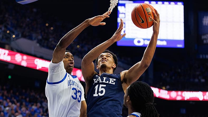 Dec 10, 2022; Lexington, Kentucky, USA; Yale Bulldogs forward EJ Jarvis (15) goes to the basket during the first half against the Kentucky Wildcats at Rupp Arena at Central Bank Center. Mandatory Credit: Jordan Prather-USA TODAY Sports