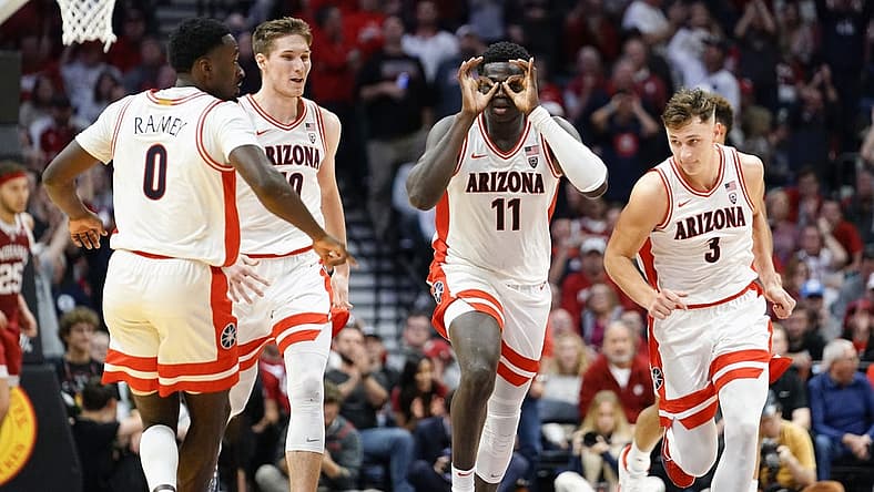 Dec 10, 2022; Las Vegas, Nevada, USA; Arizona Wildcats center Oumar Ballo (11) reacts with teammates after scoring against the Indiana Hoosiers during the second half at MGM Grand Garden Arena. Mandatory Credit: Lucas Peltier-USA TODAY Sports