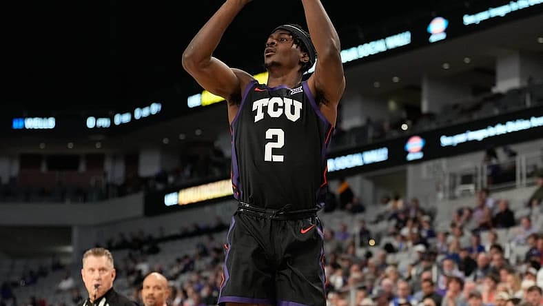 Dec 10, 2022; Fort Worth, Texas, USA;  TCU Horned Frogs forward Emanuel Miller (2) makes a three point basket against the Southern Methodist Mustangs during the first half at Dickies Arena. Mandatory Credit: Chris Jones-USA TODAY Sports