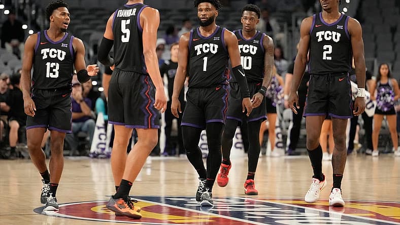 Dec 10, 2022; Fort Worth, Texas, USA; The TCU Horned Frogs huddle during a break in play in the second half against the Southern Methodist Mustangs at Dickies Arena. Mandatory Credit: Chris Jones-USA TODAY Sports