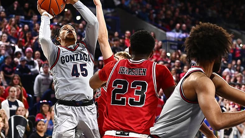 Dec 12, 2022; Spokane, Washington, USA; Gonzaga Bulldogs guard Rasir Bolton (45) shoots the ball against Northern Illinois Huskies forward Harvin Ibarguen (23) in the first half at McCarthey Athletic Center. Mandatory Credit: James Snook-USA TODAY Sports