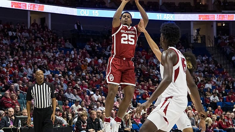 Dec 10, 2022; Tulsa, Oklahoma, USA; Oklahoma Sooners guard Grant Sherfield (25) takes a shot during the first half against the Arkansas Razorbacks at BOK Center. Arkansas won 88-78. Mandatory Credit: Brett Rojo-USA TODAY Sports