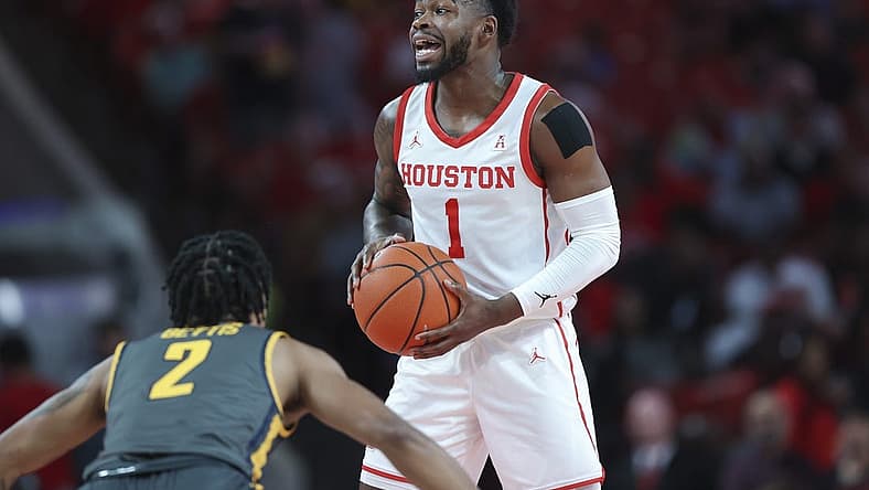 Dec 13, 2022; Houston, Texas, USA; Houston Cougars guard Jamal Shead (1) controls the ball during the first half against the North Carolina A&T Aggies at Fertitta Center. Mandatory Credit: Troy Taormina-USA TODAY Sports