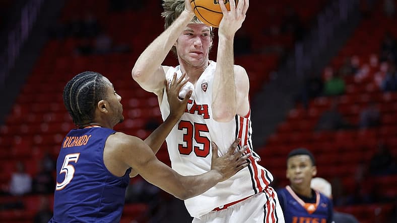 Dec 13, 2022; Salt Lake City, Utah, USA; Utah Utes center Branden Carlson (35) looks to shoot against Texas-San Antonio Roadrunners guard DJ Richards (5) in the second half at Jon M. Huntsman Center. Mandatory Credit: Jeffrey Swinger-USA TODAY Sports