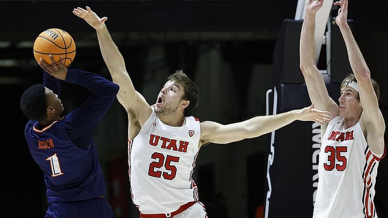 Dec 13, 2022; Salt Lake City, Utah, USA; Texas-San Antonio Roadrunners guard Japhet Medor (1) looks to shoot against Utah Utes guard Rollie Worster (25) and center Branden Carlson (35) at Jon M. Huntsman Center. Mandatory Credit: Jeffrey Swinger-USA TODAY Sports