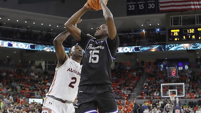 Dec 14, 2022; Auburn, Alabama, USA; Georgia State Panthers forward Ja'Heim Hudson (15) takes a shot against Auburn Tigers forward Jaylin Williams (2) during the first half at Neville Arena. Mandatory Credit: John Reed-USA TODAY Sports