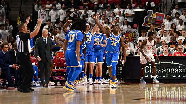 Dec 14, 2022; College Park, Maryland, USA; UCLA Bruins guard David Singleton (34) reacts after making a three point shot during the second half against the Maryland Terrapins at Xfinity Center. Mandatory Credit: Tommy Gilligan-USA TODAY Sports
