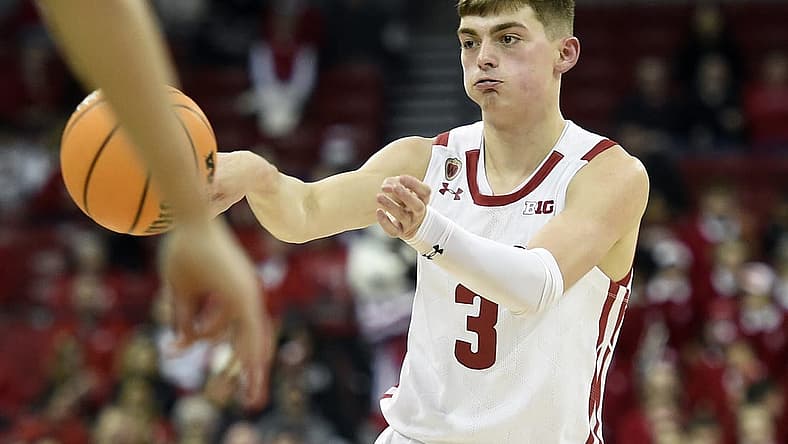 Dec 15, 2022; Madison, Wisconsin, USA;  Wisconsin Badgers guard Connor Essegian (3) passes the ball during the second half against the Lehigh Mountain Hawks at the Kohl Center. Mandatory Credit: Kayla Wolf-USA TODAY Sports