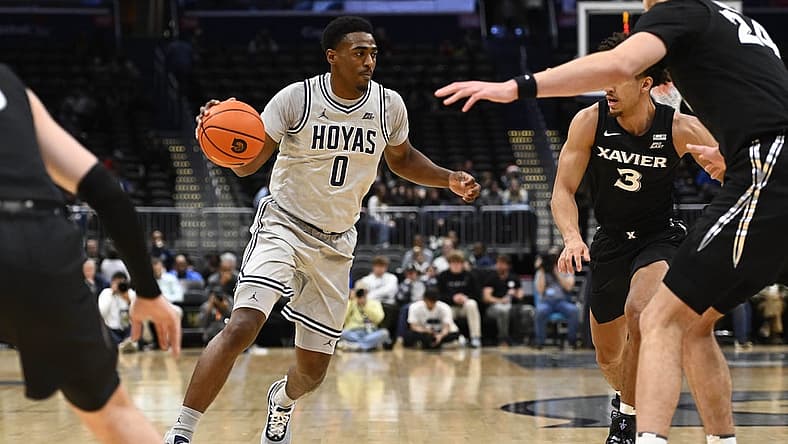 Dec 16, 2022; Washington, District of Columbia, USA; Georgetown Hoyas guard Brandon Murray (0) dribbles against the Xavier Musketeers during the first half at Capital One Arena. Mandatory Credit: Brad Mills-USA TODAY Sports