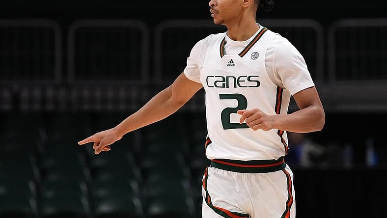 Dec 17, 2022; Coral Gables, Florida, USA; Miami Hurricanes guard Isaiah Wong (2) gestures while running up the court during the first half against the St. Francis Red Flash at Watsco Center. Mandatory Credit: Jasen Vinlove-USA TODAY Sports