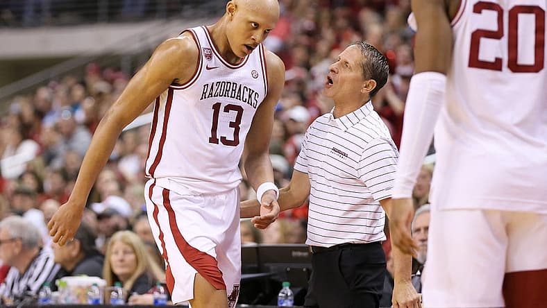 Dec 17, 2022; North Little Rock, Arkansas, USA; Arkansas Razorbacks head coach Eric Musselman talks to guard Jordan Walsh (13) in the first half against the Bradley Braves at Simmons Bank Arena. Mandatory Credit: Nelson Chenault-USA TODAY Sports