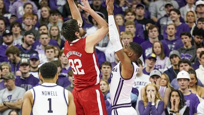 Dec 17, 2022; Kansas City, Missouri, USA; Nebraska Cornhuskers forward Wilhelm Breidenbach (32) shoots over Kansas State Wildcats forward David N'Guessan (3) during the first half at T-Mobile Center. Mandatory Credit: Denny Medley-USA TODAY Sports