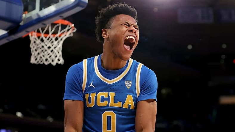 Dec 17, 2022; New York, New York, USA; UCLA Bruins guard Jaylen Clark (0) reacts after dunking against the Kentucky Wildcats during the final seconds of the second half at Madison Square Garden. Mandatory Credit: Brad Penner-USA TODAY Sports