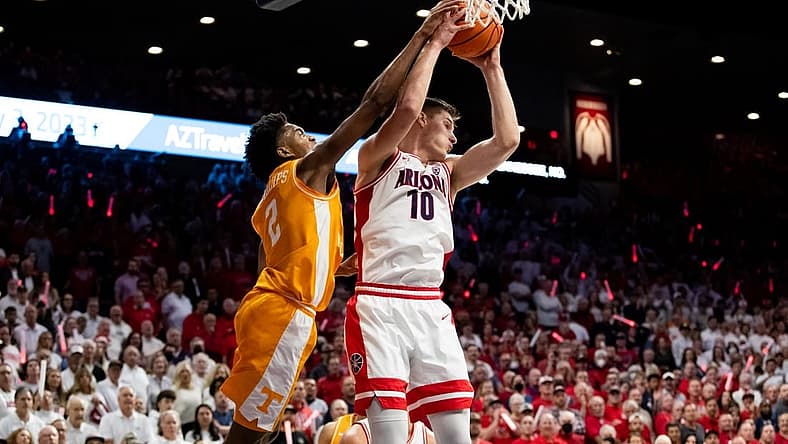 Dec 17, 2022; Tucson, Arizona, USA; Arizona Wildcats forward Azuolas Tubelis (10) grabs a rebound against Tennessee Volunteers forward Julian Phillips (2) during the first half at McKale Center. Mandatory Credit: Zachary BonDurant-USA TODAY Sports