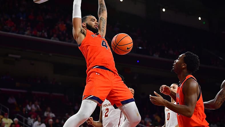 Dec 18, 2022; Los Angeles, California, USA; Auburn Tigers forward Johni Broome (4) dunks for the basket against the Southern California Trojans during the second half at Galen Center. Mandatory Credit: Gary A. Vasquez-USA TODAY Sports