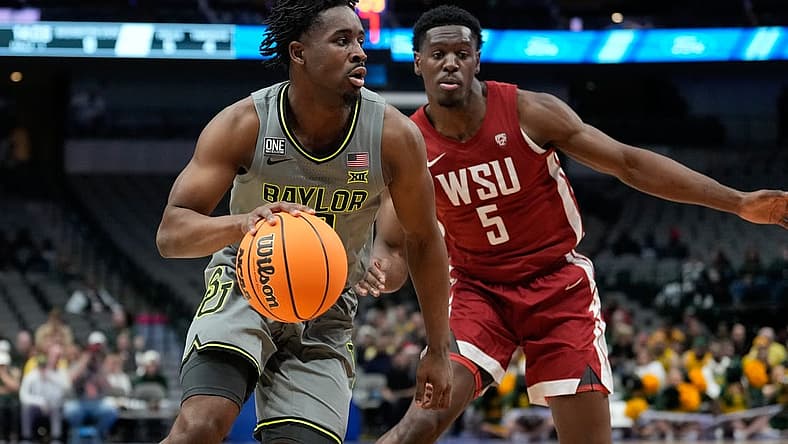 Dec 18, 2022; Dallas, Texas, USA;  Baylor Bears guard Adam Flagler (10) drives to the basket past Washington State Cougars guard TJ Bamba (5) during the first half at American Airlines Center. Mandatory Credit: Chris Jones-USA TODAY Sports