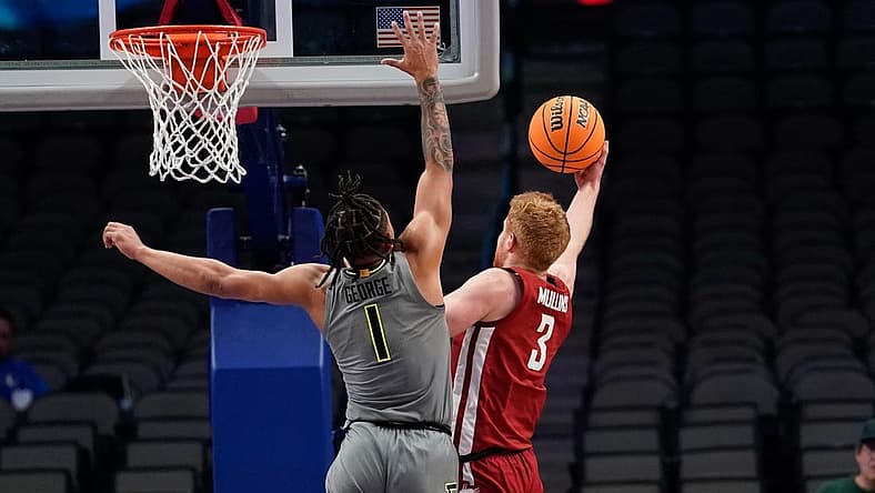 Dec 18, 2022; Dallas, Texas, USA; Washington State Cougars guard Jabe Mullins (3) scores a layup against Baylor Bears guard Keyonte George (1) during the second half at American Airlines Center. Mandatory Credit: Chris Jones-USA TODAY Sports