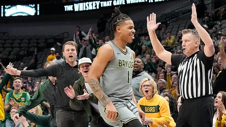 Dec 18, 2022; Dallas, Texas, USA; Baylor Bears guard Keyonte George (1) celebrates with fans after making a three point basket against the Washington State Cougars during the second half at American Airlines Center. Mandatory Credit: Chris Jones-USA TODAY Sports