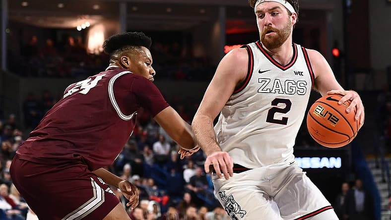 Dec 20, 2022; Spokane, Washington, USA; Gonzaga Bulldogs forward Drew Timme (2) shoots the ball against Montana Grizzlies forward Dischon Thomas (24) in the second half at McCarthey Athletic Center. Gonzaga won 85-75. Mandatory Credit: James Snook-USA TODAY Sports