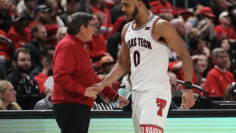 Dec 21, 2022; Lubbock, Texas, USA;  Texas Tech Red Raiders head coach Mark Adams greets forward Kevin Obanor (0) as he leaves the game in the second half against the Houston Christian Huskies at United Supermarkets Arena. Mandatory Credit: Michael C. Johnson-USA TODAY Sports