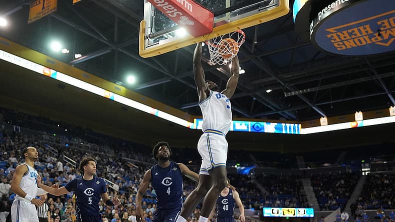 Dec 21, 2022; Los Angeles, California, USA; UCLA Bruins forward Adem Bona (3) dunks the ball against the UC Davis Aggies in the second half at Pauley Pavilion presented by Wescom. UCLA defeated UC Davis 81-54. Mandatory Credit: Kirby Lee-USA TODAY Sports