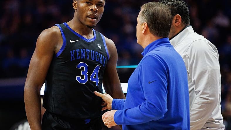 Dec 21, 2022; Lexington, Kentucky, USA; Kentucky Wildcats forward Oscar Tshiebwe (34) talks with head coach John Calipari during the first half against the Florida A&M Rattlers at Rupp Arena at Central Bank Center. Mandatory Credit: Jordan Prather-USA TODAY Sports