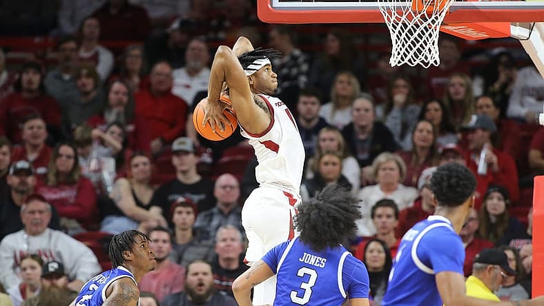 Dec 21, 2022; Fayetteville, Arkansas, USA; Arkansas Razorbacks guard Ricky Council IV (1) goes up for a dunk in the first half against the UNC Asheville Bulldogs at Bud Walton Arena. Mandatory Credit: Nelson Chenault-USA TODAY Sports