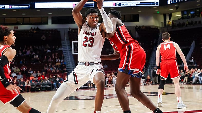 Dec 22, 2022; Columbia, South Carolina, USA; South Carolina Gamecocks forward Gregory Jackson II (23) drives against the Western Kentucky Hilltoppers in the second half at Colonial Life Arena. Mandatory Credit: Jeff Blake-USA TODAY Sports