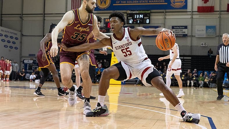 Dec 22, 2022; Santa Cruz, California, USA; Stanford Cardinal forward Harrison Ingram (55) controls the ball during the first half against Loyola Ramblers center Bryce Golden (35) at Kaiser Permanente Arena. Mandatory Credit: Stan Szeto-USA TODAY Sports