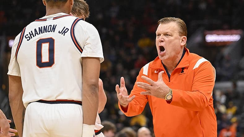 Dec 22, 2022; St. Louis, Missouri, USA; Illinois Fighting Illini head coach Brad Underwood reacts as he talks to guard Terrence Shannon Jr. (0) during the second half against the Missouri Tigers at Enterprise Center. Mandatory Credit: Jeff Curry-USA TODAY Sports