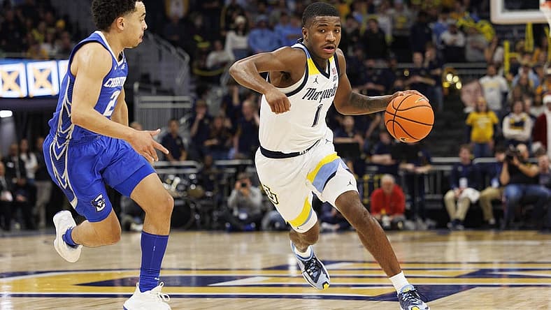 Dec 16, 2022; Milwaukee, Wisconsin, USA; Marquette Golden Eagles guard Kam Jones (1) during the game against the Creighton Bluejays at Fiserv Forum. Mandatory Credit: Jeff Hanisch-USA TODAY Sports