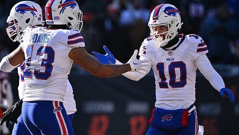 Dec 24, 2022; Chicago, Illinois, USA; Buffalo Bills wide receiver Khalil Shakir (10) celebrates with wide receiver Gabe Davis (13) after scoring a successful two-point try in the third quarter against the Chicago Bears at Soldier Field. Buffalo defeated Chicago 35-13. Mandatory Credit: Jamie Sabau-USA TODAY Sports