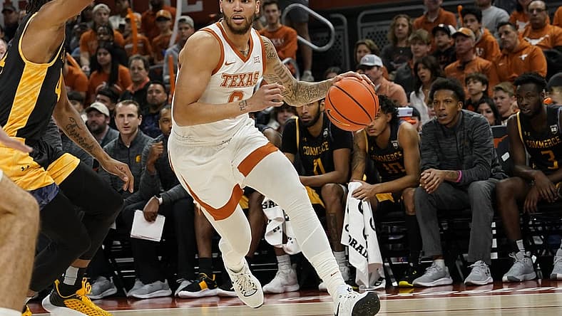 Dec 27, 2022; Austin, Texas, USA; Texas Longhorns forward Timmy Allen (0) drives to the basket during the first half against the Texas A&M-Commerce Lions at Moody Center. Mandatory Credit: Scott Wachter-USA TODAY Sports