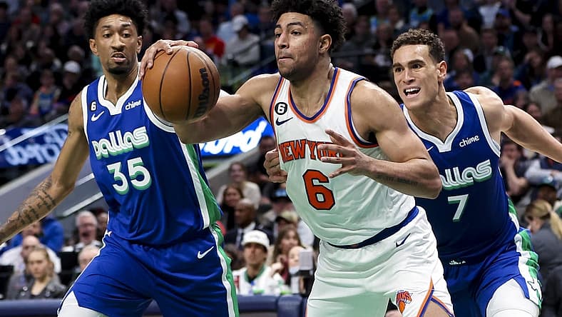 Dec 27, 2022; Dallas, Texas, USA; New York Knicks guard Quentin Grimes (6) looks to score as Dallas Mavericks center Dwight Powell (7) and Dallas Mavericks forward Christian Wood (35) defend during the second quarter at American Airlines Center. Mandatory Credit: Kevin Jairaj-USA TODAY Sports
