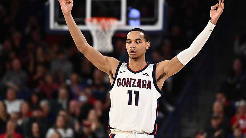 Dec 28, 2022; Spokane, Washington, USA; Gonzaga Bulldogs guard Nolan Hickman (11) celebrates after a Bulldogs three-point basket against the Eastern Oregon Mountaineers in the first half at McCarthey Athletic Center. Mandatory Credit: James Snook-USA TODAY Sports