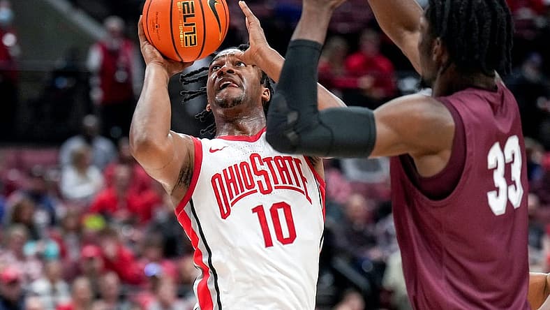 Dec 29, 2022; Columbus, Ohio, United States; Ohio State Buckeyes forward Brice Sensabaugh (10) makes a shot attempt while defended by Alabama A&M Bulldogs center Olisa Blaise Akonobi (33) during the second half of the NCAA division I basketball game between the Ohio State Buckeyes and the Alabama A&M Bulldogs at Value City Arena. Mandatory Credit: Joseph Scheller-The Columbus Dispatch
Basketball Ceb Mbk Alabama Alabama A M At Ohio State