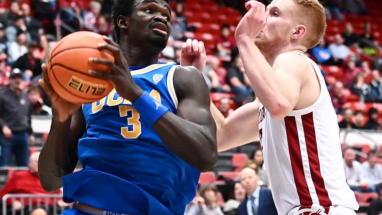 Dec 30, 2022; Pullman, Washington, USA; UCLA Bruins forward Adem Bona (3) shoots the ball against Washington State Cougars guard Jabe Mullins (3) in the second half at Friel Court at Beasley Coliseum. Bruins won 67-66. Mandatory Credit: James Snook-USA TODAY Sports