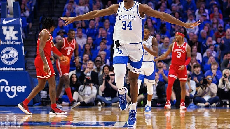 Dec 31, 2022; Lexington, Kentucky, USA; Kentucky Wildcats forward Oscar Tshiebwe (34) celebrates during the first half against the Louisville Cardinals at Rupp Arena at Central Bank Center. Mandatory Credit: Jordan Prather-USA TODAY Sports