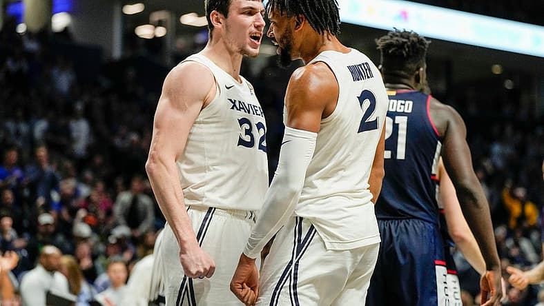 Xavier Musketeers forward Zach Freemantle (32) and Jerome Hunter (2) celebrate after Hunter is fouled by the Connecticut Huskies Saturday, December 31, 2022 at the Cintas Center. The Musketeers upset the Huskies 83-73.
Xavier Uconn10
