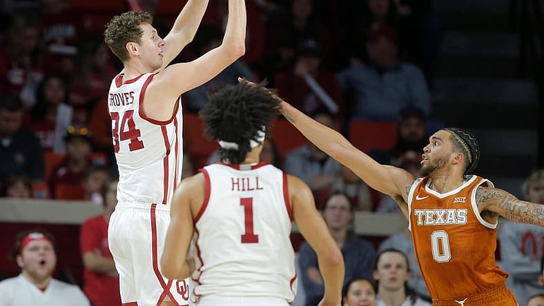 Oklahoma Sooners forward Jacob Groves (34) shoots over Texas Longhorns forward Timmy Allen (0) during an NCAA men's college basketball game between the University of Oklahoma and Texas at Lloyd Noble Center in Norman, Okla., Saturday, Dec. 31, 2022.
Oklahoma Vs Texas Basketball