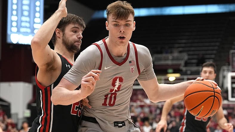 Dec 31, 2022; Stanford, California, USA; Stanford Cardinal forward Max Murrell (10) dribbles against Utah Utes guard Rollie Worster (25) during the first half at Maples Pavilion. Mandatory Credit: Darren Yamashita-USA TODAY Sports
