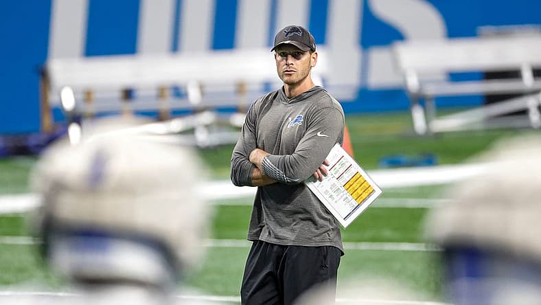 Lions offensive coordinator Ben Johnson watches open practice at Family Fest at Ford Field on Saturday, August 6, 2022.