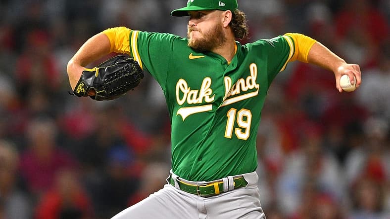 Sep 29, 2022; Anaheim, California, USA; Oakland Athletics starting pitcher Cole Irvin (19) throws to the plate in the third inning against the Los Angeles Angels at Angel Stadium. Mandatory Credit: Jayne Kamin-Oncea-USA TODAY Sports
