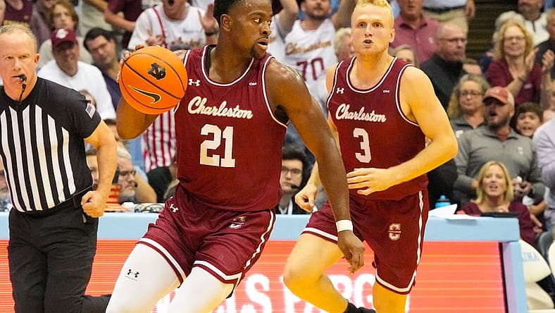 Nov 11, 2022; Chapel Hill, North Carolina, USA; Charleston Cougars guard Jaylon Scott (21) dribbles the ball next to guard Dalton Bolon (3) during the first half at Dean E. Smith Center. Mandatory Credit: James Guillory-USA TODAY Sports
