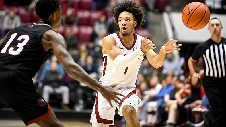 Nov 18, 2022; Tuscaloosa, AL, USA; Alabama guard Mark Sears (1) passes the ball to the corner with Jacksonville State guard Peyton Daniels (13) defending at Coleman Coliseum.
Ncaa Basketball Alabama Vs Jacksonville State Men S Basketball