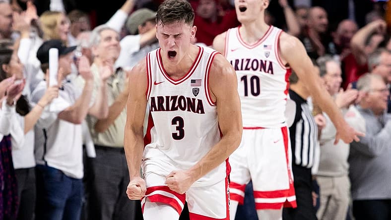 Dec 17, 2022; Tucson, Arizona, USA; Arizona Wildcats guard Pelle Larsson (3) and forward Azuolas Tubelis (10) celebrate during the second half of a victory over the Tennessee Volunteers at McKale Center. Mandatory Credit: Zachary BonDurant-USA TODAY Sports