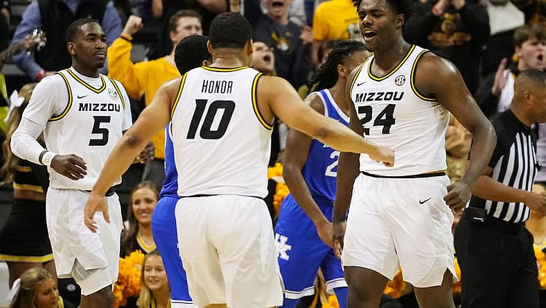 Dec 28, 2022; Columbia, Missouri, USA; Kentucky Wildcats forward Chris Livingston (24) celebrates after scoring with guard Nick Honor (10) and guard D'Moi Hodge (5) during the first half against the Kentucky Wildcats at Mizzou Arena. Mandatory Credit: Jay Biggerstaff-USA TODAY Sports